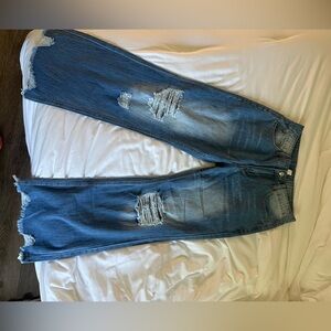 Online boutique medium wash- wide leg distressed jeans.